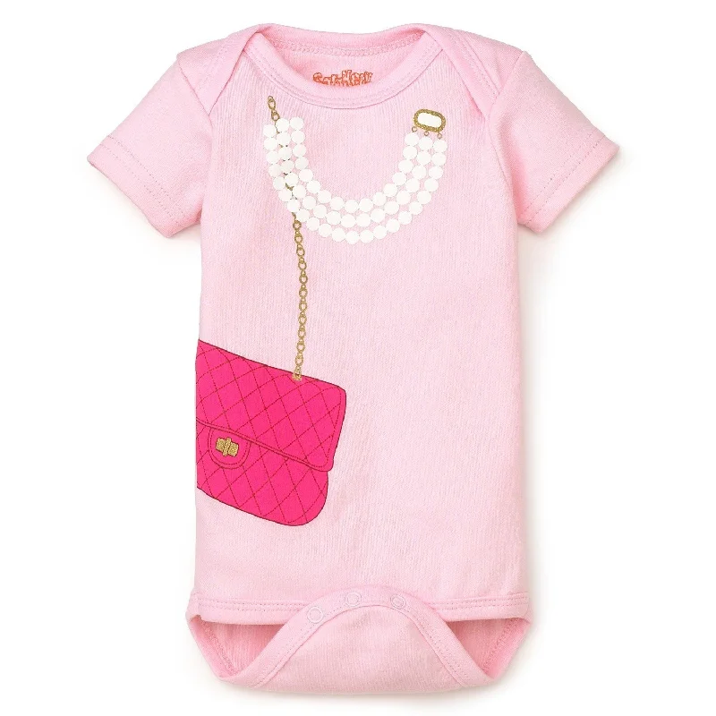 off-the-shoulder dressSara Kety Pearls & Pink Bag