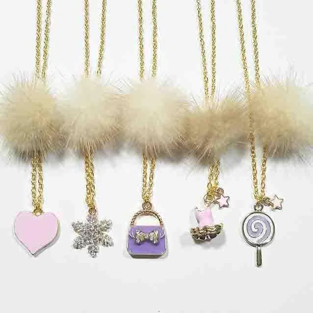 sleek midi dressHeart Me Beige Fur Pom Necklaces